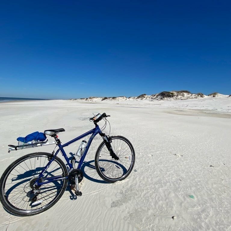 cape-san-blas-vacation-rentals-vrbo-dog-friendly-346 Cape San Blas Vacation Rentals decorative image of bike on a beach